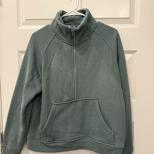 Woman’s Green Half-Zip Sweater